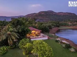 StayVista at Three Shores with Lake View & Alfresco Dining