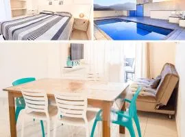 Apto espaçoso no Itaguá | varanda Gourmet | Ar-condicionado | Piscina externa