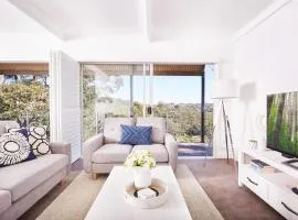 Bright And Spacious Family Home With Leafy Deck