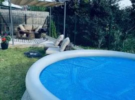 Exclusive Garden Oasis with Jacuzzi & Private Parking