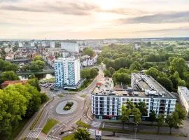 Młyńska 10 by Apartamenty Nad Parsętą, beach hotel in Kołobrzeg