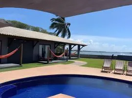 Casa Ilha| beira mar, piscina aquecida, 4 suítes