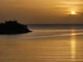 Tina-Cay Sunset Escape