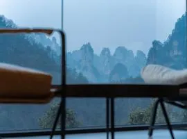 Zhangjiajie YOMO Retreat--Best Avatar Mount View, Free shuttle service to south gate of the forest park,Free Fresh Coffee,Free Self-Service Laundry & Drying, Entrance Ticket Serivce,Wholesome food,Travel Guide
