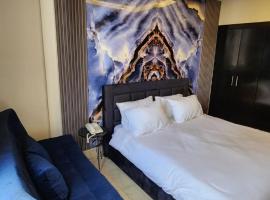 ParkLane Suites, khách sạn ở Al Qanţārī