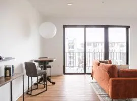 Chic East Side 1BR Apt with Balcony, Pool, and Gym