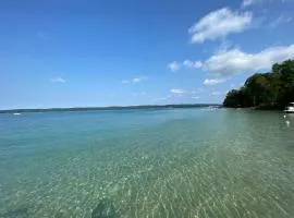 Torch Lake Blue 4BDR Beachfront House ➠ 2364