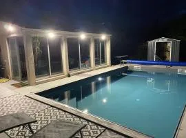 Chambre avec vue sur le marais et la piscine