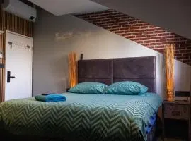 Koraal - Comfortabele kamer bij B&B Gezond aan Zee - Toegang Wellnesstuin meerprijs