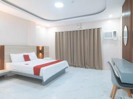 RedDoorz at Happy Stay Apartelle, ξενοδοχείο σε Dauis