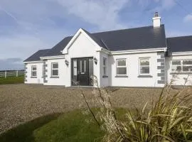 Matthews Cottage Doonbeg sleeps 6 by Trident Holiday Homes