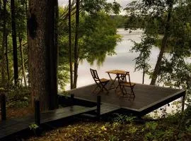 Riverfront design cabins by Ragnar Glamp