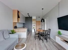 Obrońców Wybrzeża by Downtown Apartments