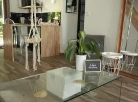 Loveroom atypique en duplex avec balnéo ronde et secret'room