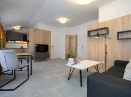 ALURE RESIDENCES 11 - 24h self check-in & private parking next to the apartment building included, CITY CENTER right on SNP Square in a quiet passage, new building, best deal in town