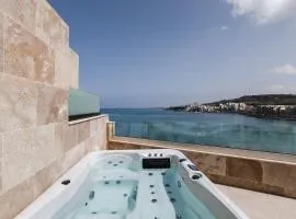 DuplexPenthouse seafront with hot tub by Homely