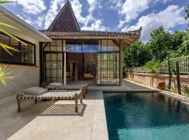 The Pink Joglo, a cheerful 3BDR Villa W/Pool and Rice-field view., khách sạn ở Dalung