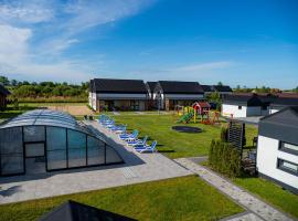 Wakacyjna Osada、Jezierzanyのシャレー