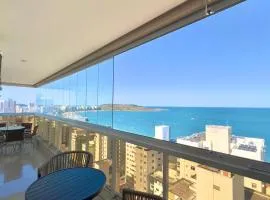 PRAIA DO MORRO DESLUMBRANTE VISTA MAR, apto novo e moderno, a uma quadra da praia, redes de proteção, quartos com ar condicionado, roupas de cama e banho, TV 65, internet, prédio com piscina, portaria 24 horas e 2 vagas