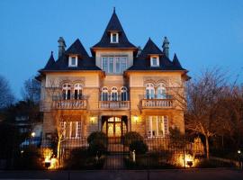 Le Castel Guesthouse, casa de hóspedes em Bayeux