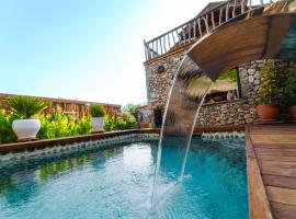 LEVISSI LODGE OTANTIC STONE VILLA in KAYAKOY, chalet de monta&ntilde;a en Kayakoy