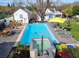 Greyton Toad Hall exclusive use up to 18 and by supplement up to 22 with massive pool and hot tub and sometimes we rent individual rooms