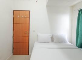 Nice and Homey 2BR at Vida View Makasar Apartment By Travelio, hotel din Pampang