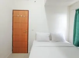 Nice and Homey 2BR at Vida View Makasar Apartment By Travelio
