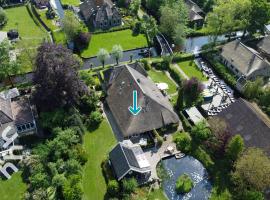 OV592- 2P apartment in the heart of Giethoorn, hotel en Giethoorn
