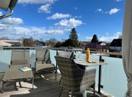 ZUM LEUCHTTURM Wellness-Appartement APPARTO Grömitz, хотел в Грьомиц