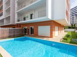 Luxury 5 min Beach with Balcony, Pool, Wifi, AC, SmartTV