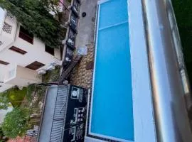THREE-BEDROOM FULLy FURNISHED BEACH VIEW APARTMENT WITH A SWIMMING