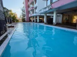 OCEAN-BREEZE TWO BEDROOM APARTMENt WITH A SWIMMING POOL