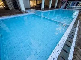 OCEAN-BREEZE TWO BEDROOM APARTMENt WITH A SWIMMING POOL