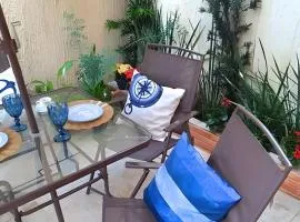 Studio pé na areia com área de churrasco privativa