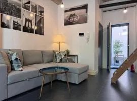 Modern cozy studio with backyard