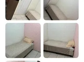 Quarto rosa em frente moradia unicamp