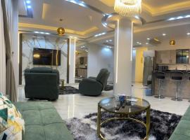 شقة فندقية غرفتين بكمبوند قرب ميدان جهينة, hôtel à Sheikh Zayed