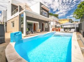 Casa Férias Charneca da Caparica, готель у місті Шарнека