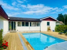 Hus med uppvärmd pool