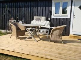 F&ouml;rtjusande g&auml;sthus med parkering