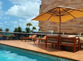 Casa Oiti: à Beira-Mar de Tambaú na melhor localização de João Pessoa - Piscina, Aconchego e Lazer，位于若昂佩索阿的酒店