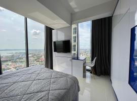 PANORAMIC Apartment Units with VIEWS Managed by AIO Pollux Meisterdadt, acomoda&ccedil;&atilde;o com cozinha em Batam Center