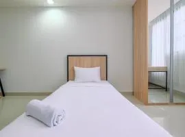 Minimalist Studio Room at Evenciio Margonda Apartment By Travelio