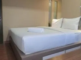 Elegant and Comfortable 1BR at Uttara The Icon Apartment By Travelio