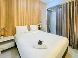 Nice and Cozy Studio at Amartha View Apartment By Travelio