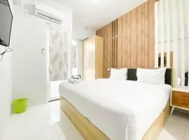 Homey 1BR without Living Room at Amartha View Apartment By Travelio