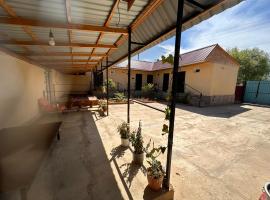 Guest house Yntymak, hotel v destinaci Tossor