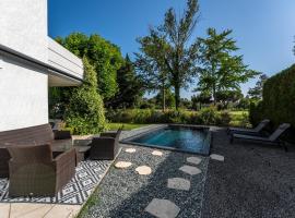 1ère ligne sur le golf piscine, clim, barbecue, hotel din Baillargues