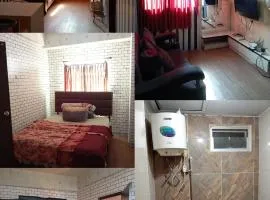 Type studio plus apartment the suites metro BARBIE HOMESTAY